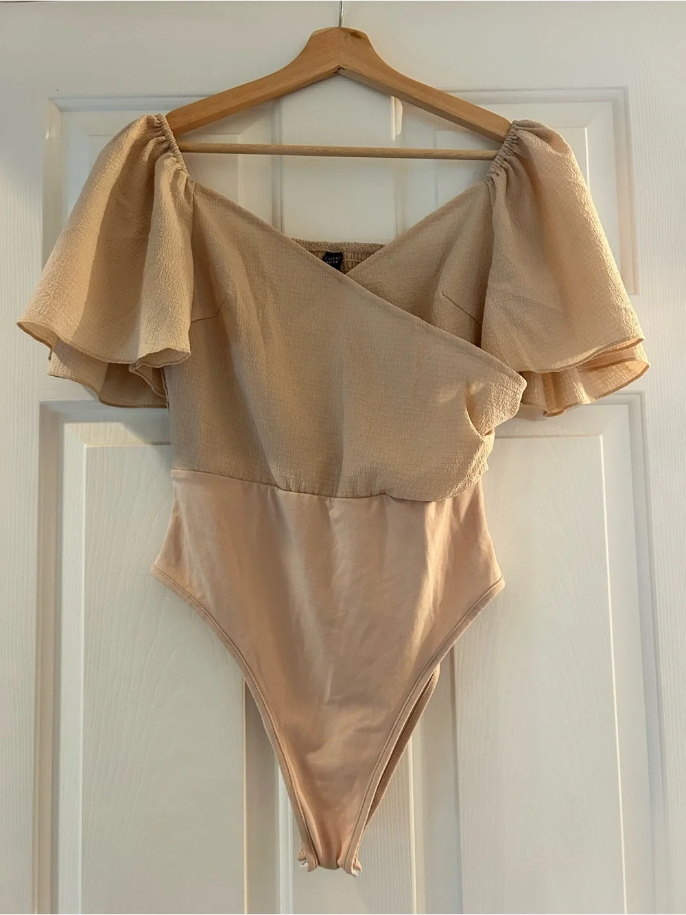 Emery Rose Cream Body Suit